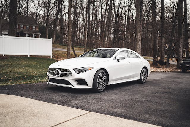 Black Mercedes-Benz luxury sedan for executive chauffeur service